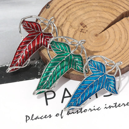 Broche Folhas Verdes de Lórien – O Senhor dos Anéis (Elfico, Colecionável em Metal)